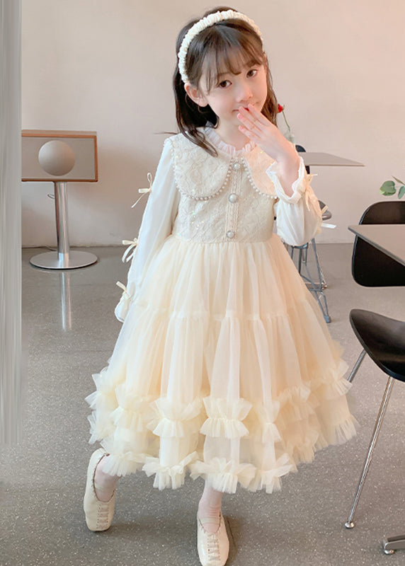 KIDS BUTTON THROUGH FRILL DRESS CHAMPAGNE COAST