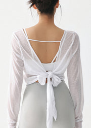 Beautiful White O-Neck Backless Tie Waist Thin Yoga Top