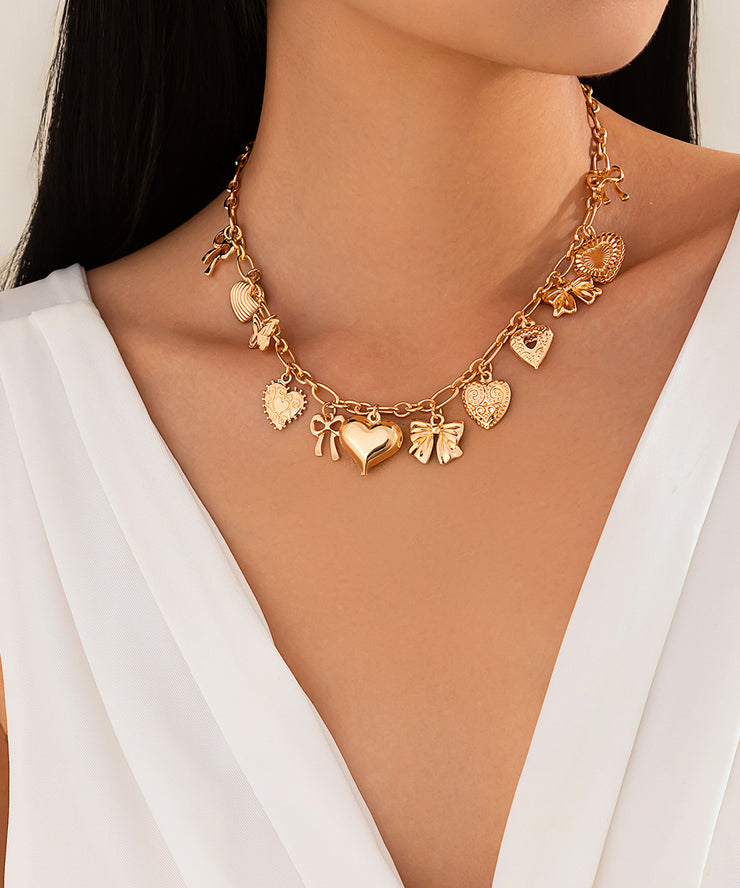 Boutique Gold Copper Alloy Love Bow Pendant Necklace