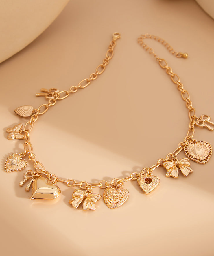 Boutique Gold Copper Alloy Love Bow Pendant Necklace