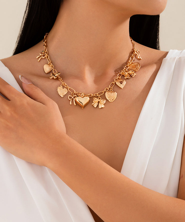 Boutique Gold Copper Alloy Love Bow Pendant Necklace
