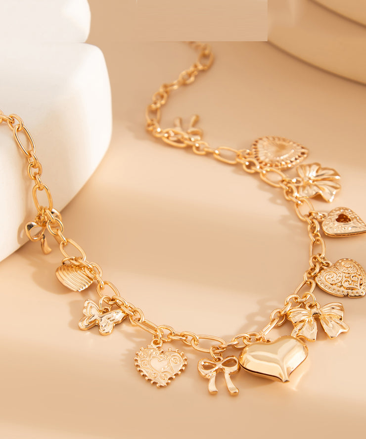Boutique Gold Copper Alloy Love Bow Pendant Necklace