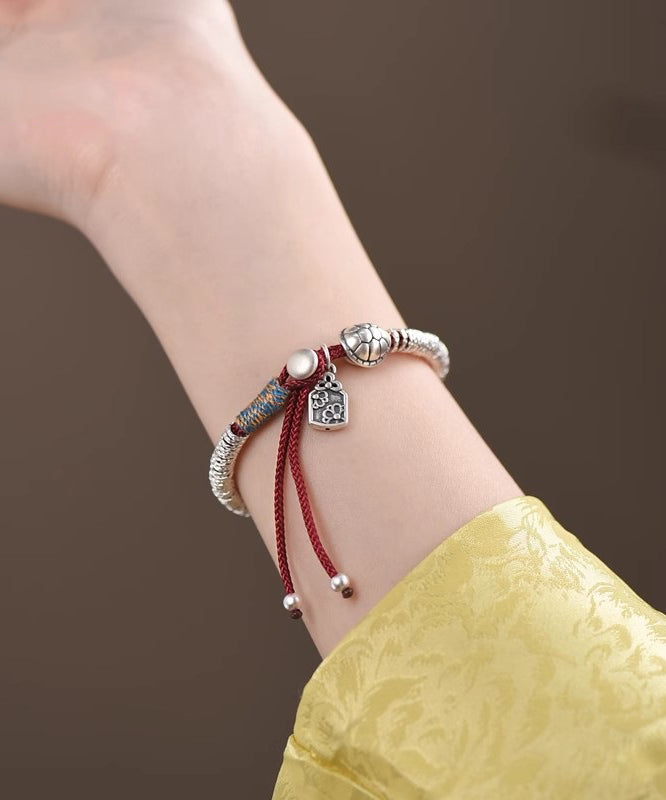 Boutique Silk Sterling Silver Broken Silver Charm Bracelet