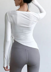 Brief White Asymmetrical Long Sleeve Tie Waist Yoga T Shirts