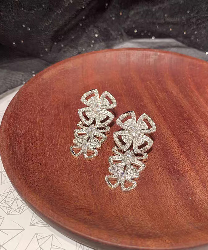 Casual White Stainless Steel Zircon Hollow Out Bow Stud Earrings