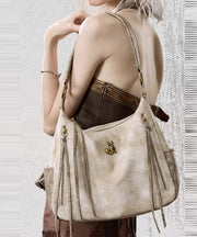 Classy Beige Tasseled Solid Durable Faux Leather Shoulder Bags