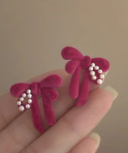 Cute Raspberry Powder Sterling Silver Flocking Pearl Bow Stud Earrings