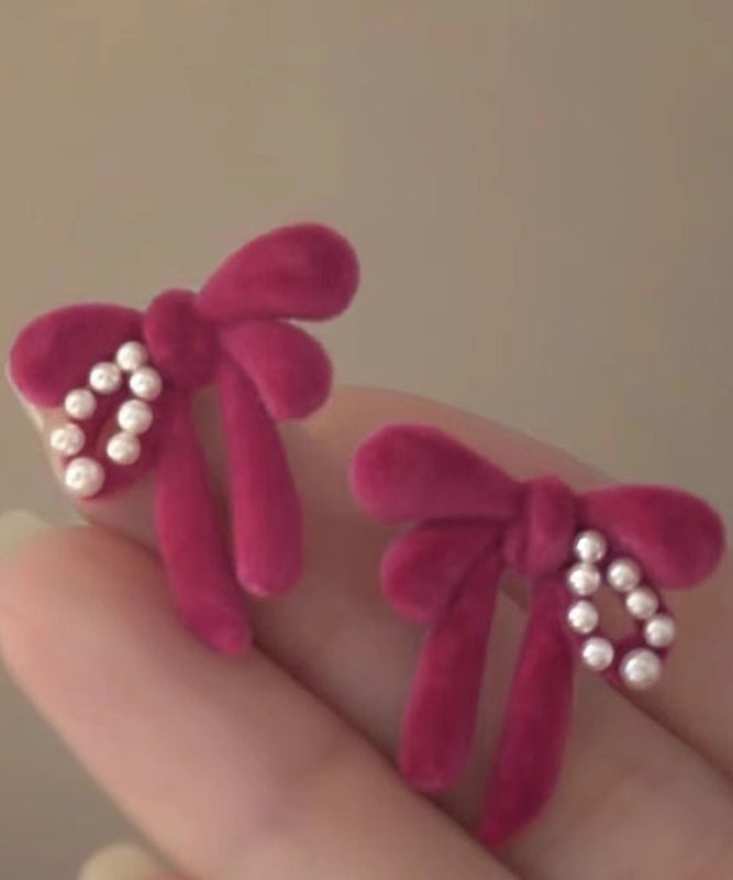 Cute Raspberry Powder Sterling Silver Flocking Pearl Bow Stud Earrings