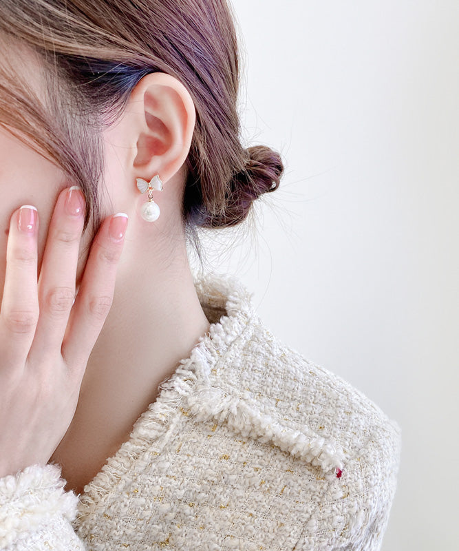 Elegant White Copper Alloy Bow Shell Pearl Drop Earrings