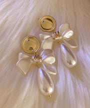 Fashion White Copper Alloy Pearl Bow Drop Earrings
