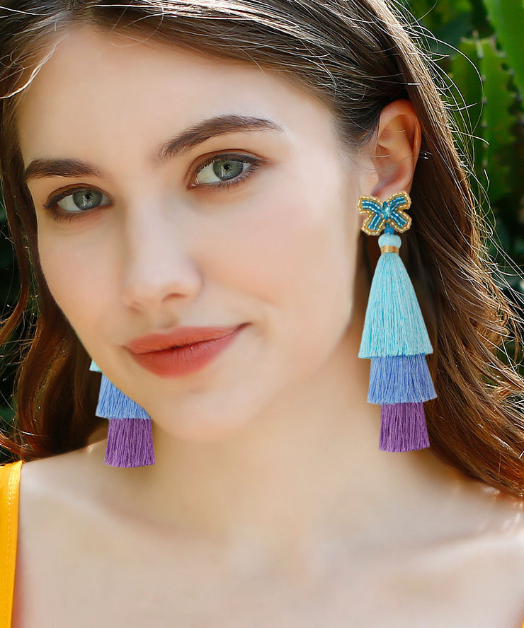 Loose Pink Coloured Glaze Tassle Butterfly Drop Earrings
