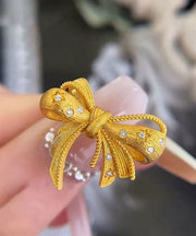 Modern Gold Copper Alloy Zircon Bow Rings