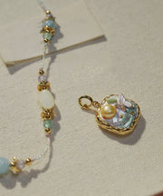 Retro Rainbow Alloy Pearl Asymmetrical Pendant Necklace