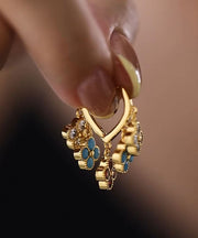 Stylish Gold Copper Overgild Four-Leaf Clover Tassel Hoop Earrings