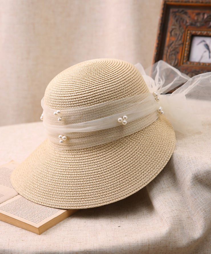 Stylish Khaki Bow Nail Bead Straw Woven Sun Hat