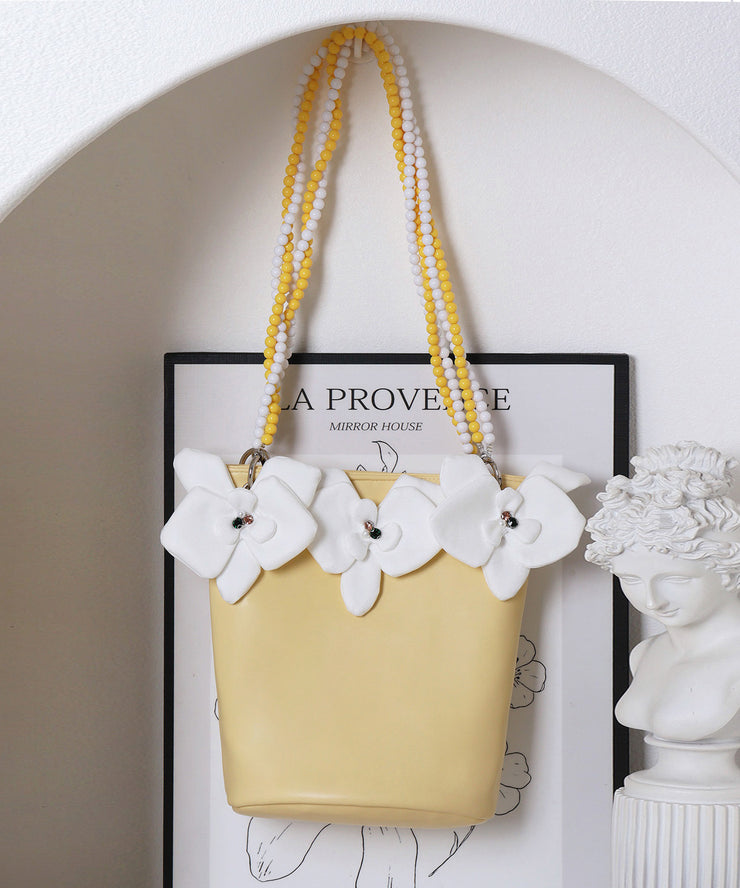 Stylish Sky Blue Butterfly Decorated Faux Leather Bucket Bag