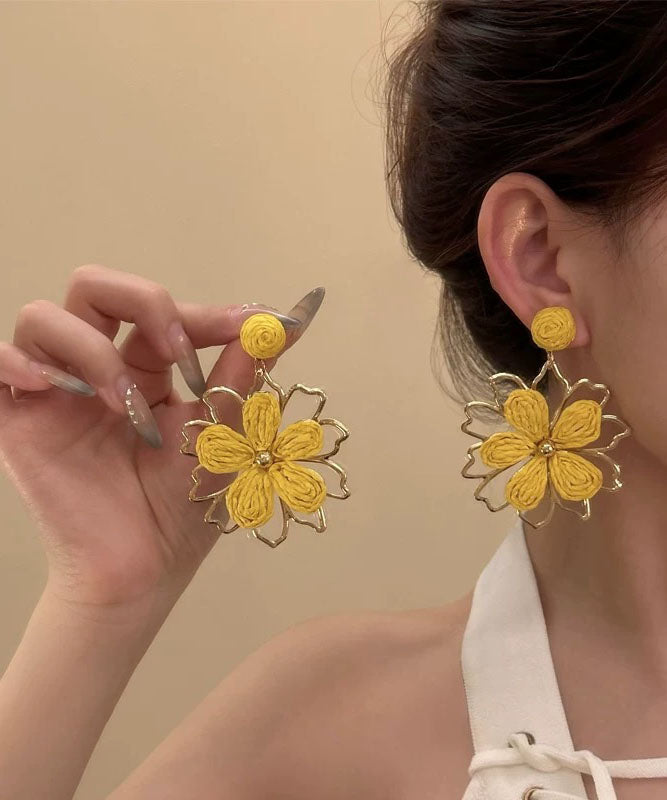 Stylish Yellow Alloy Weavin Hollow Out Floral Drop Earrings