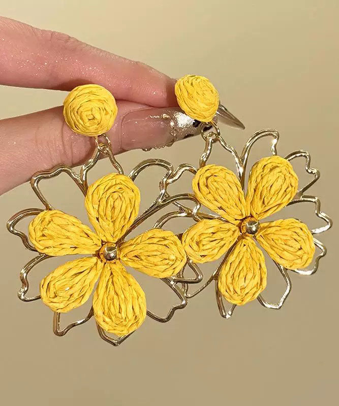 Stylish Yellow Alloy Weavin Hollow Out Floral Drop Earrings