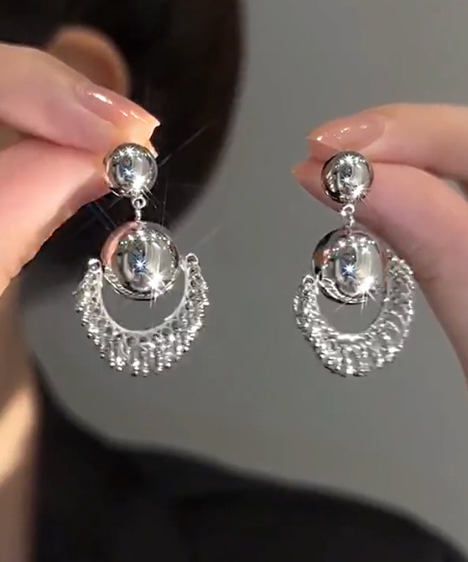 Unique Silk Stergild Silver Ball Tassel Drop Earrings