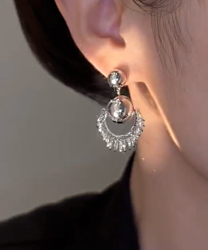 Unique Silk Stergild Silver Ball Tassel Drop Earrings