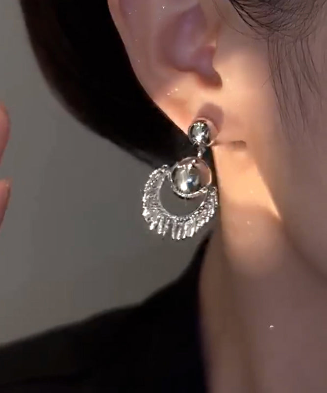 Unique Silk Stergild Silver Ball Tassel Drop Earrings