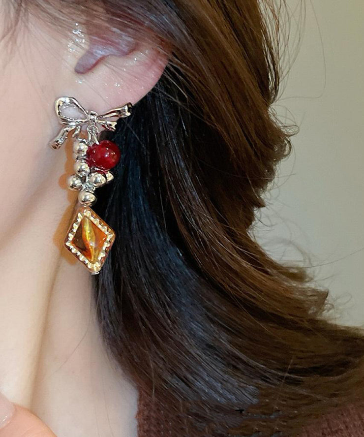Vintage Acrylic Alloy Asymmetrical Amber Bow Tassel Drop Earrings