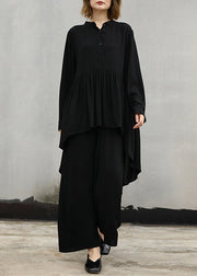 Baggy schwarzes T-Shirt aus natürlicher Baumwolle, zweiteilig. Locker sitzender Stehkragen. Cinched Holiday Tops Baggy Pants