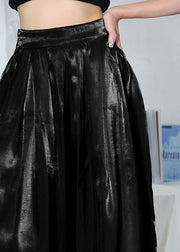 Schöne schwarze, lockere, faltige Sommerhose mit weitem Bein und hoher Taille