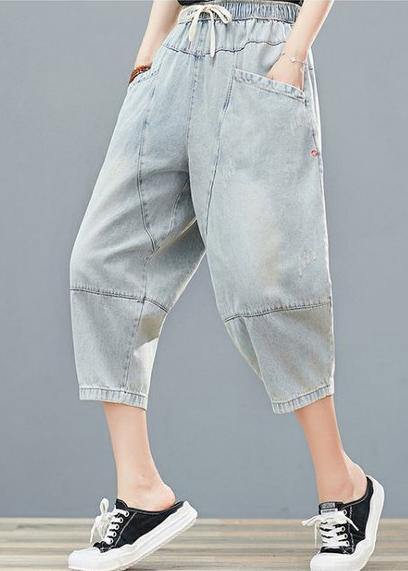 Drawstring personality pocket washed jeans plus size women&