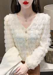 Elegantes aprikosenfarbenes Patchwork-Oberteil mit V-Ausschnitt und langen Ärmeln
