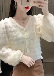 Elegantes aprikosenfarbenes Patchwork-Oberteil mit V-Ausschnitt und langen Ärmeln