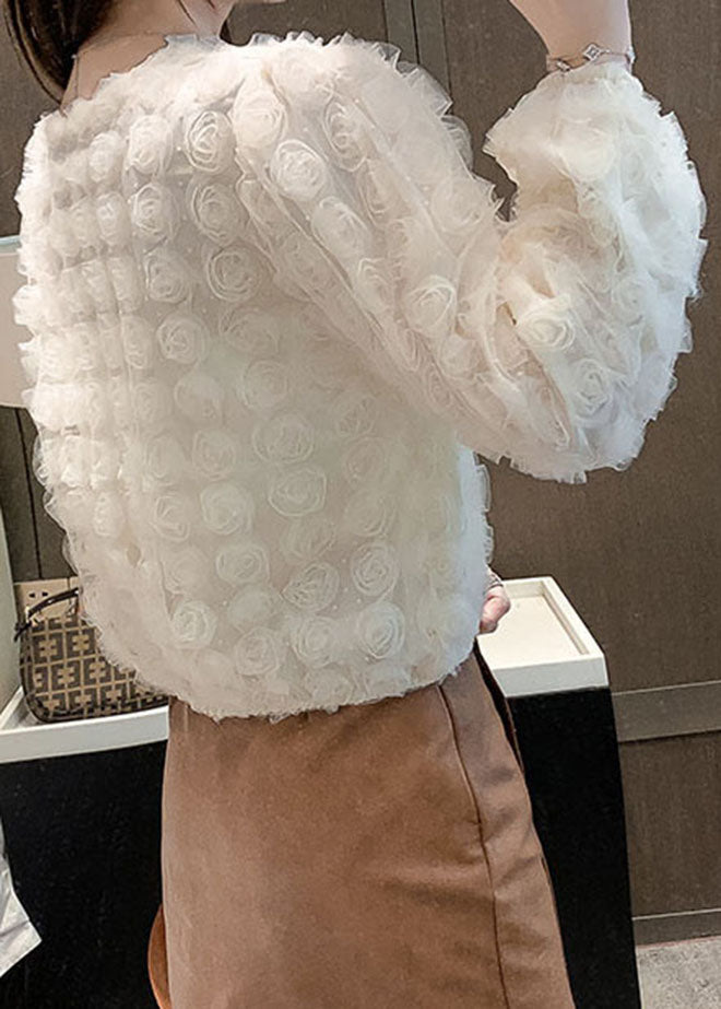 Elegantes aprikosenfarbenes Patchwork-Oberteil mit V-Ausschnitt und langen Ärmeln