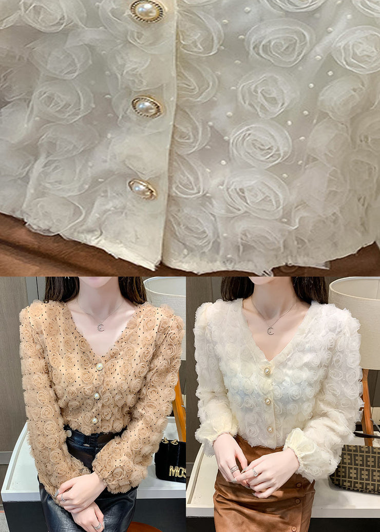 Elegantes aprikosenfarbenes Patchwork-Oberteil mit V-Ausschnitt und langen Ärmeln