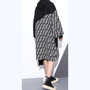 Feines schwarzes Kleid plus Größe Kapuzen-Patchwork-Langmantel Neue asymmetrische Designkleider mit langen Ärmeltaschen