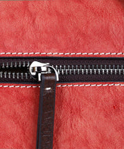 Tote Handtasche aus Kalbsleder mit Retro-Prägung in Rot