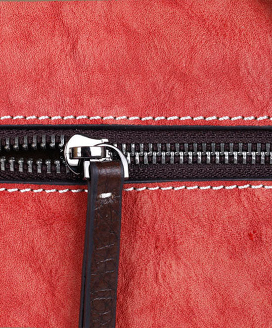 Tote Handtasche aus Kalbsleder mit Retro-Prägung in Rot