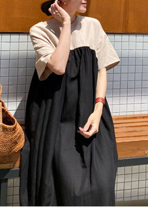 Damen Schwarzes, seitlich offenes Patchwork-Kleid mit kurzen Ärmeln