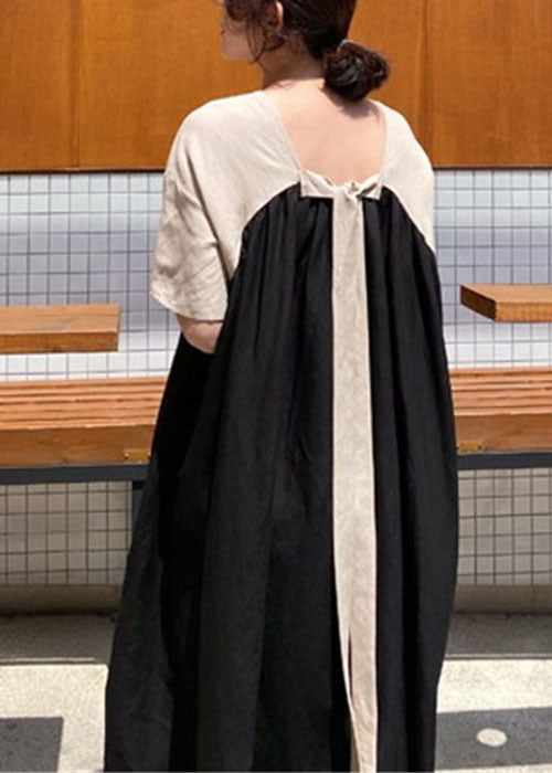 Damen Schwarzes, seitlich offenes Patchwork-Kleid mit kurzen Ärmeln